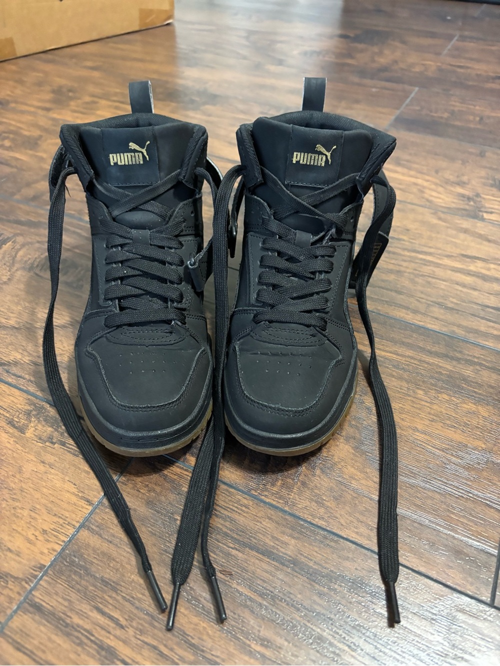 Puma Black & Gold High-Top Sneakers size 5.5